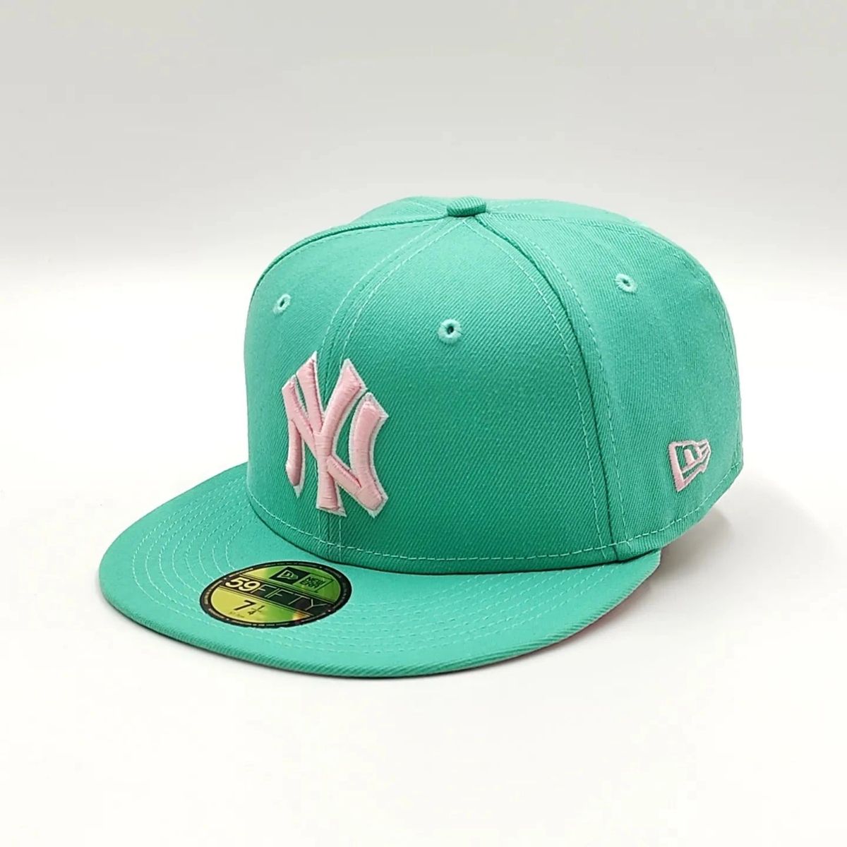 Gorra Ajustada New Era 59Fifty Exclusiva de los New York Yankees Campeones de la Serie Mundial de 1999 - Teal/Parte inferior rosa