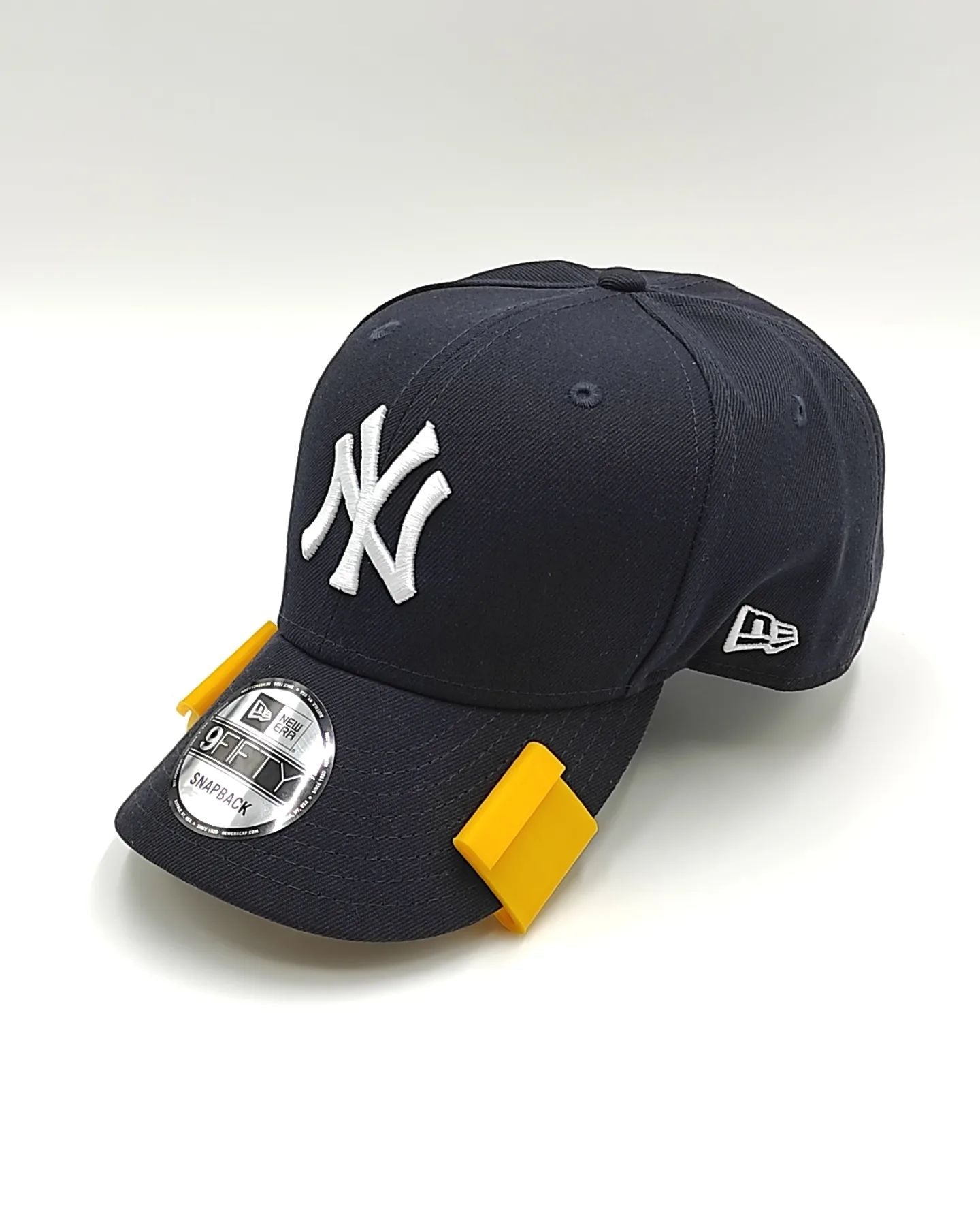 CURVADOR DE GORRAS