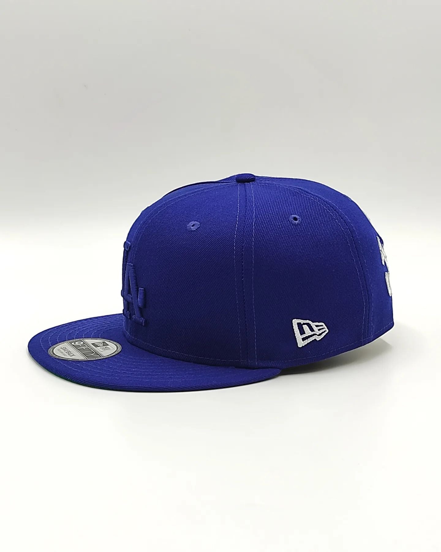 GORRA NEW ERA LOS ANGELES DODGERS LEAGUE CHAMPIONS 9FIFTY OTC