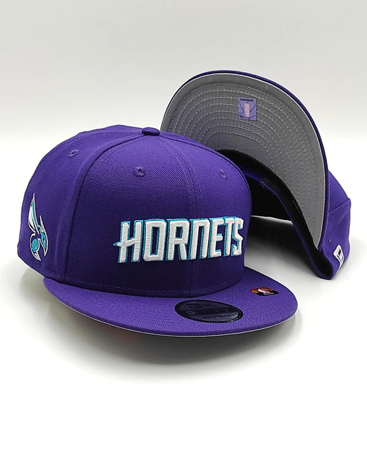 Gorra snapback 9Fifty New Era Charlotte Hornets Morada, colección jersey