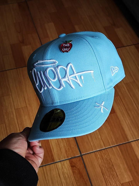 59FIFTY new era grafiti AZUL CIELO incluye pin