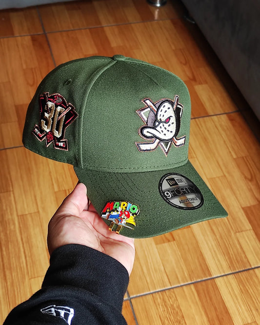 Gorra New Era Anaheim Ducks 30th Anniversary Horror Pack🔪 Green Edition 9Forty A-Frame Snapback