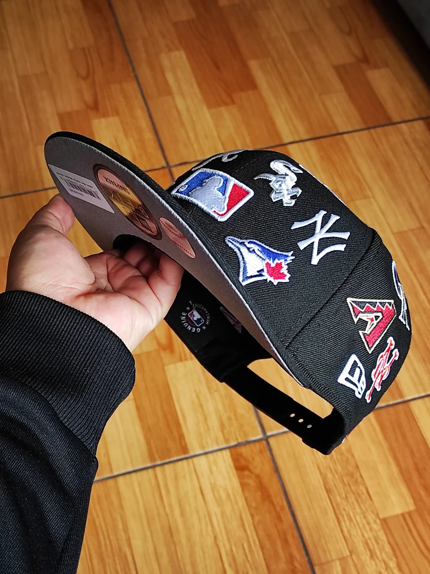 Gorra snapback New Era MLB negra 9Fifty, con logotipos de equipos de toda la liga