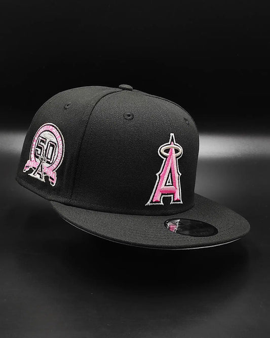 Gorra snapback New Era Anaheim Angels 50th Anniversary negra y rosa 9Fifty