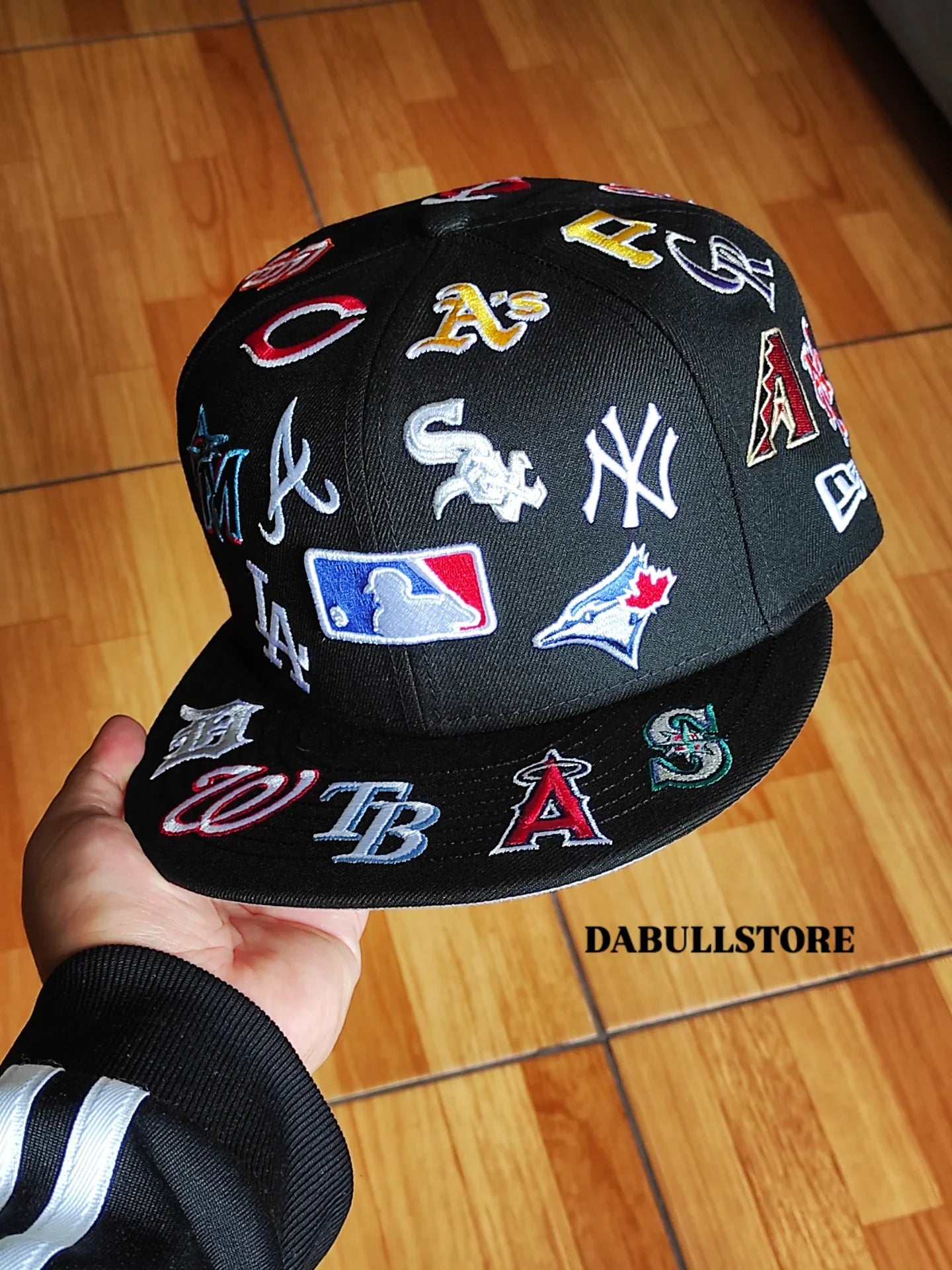 Gorra snapback New Era MLB negra 9Fifty, con logotipos de equipos de toda la liga